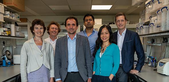 The research group leaders in a lab in the Early Cancer Institute